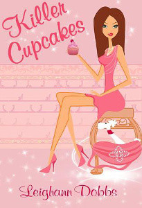 Killer Caupcakes Cover - Pink with cartoon woman holding cupcakes